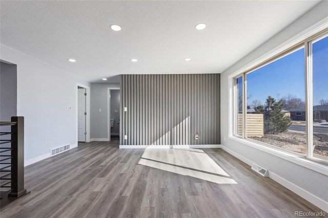 951 E 10th Ave, Broomfield, CO 80020 - spare room featuring recessed lighting, wood finished floors, and baseboards