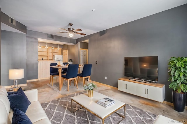 living room with ceiling fan