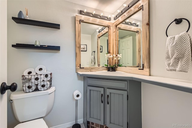 half bath with toilet and vanity