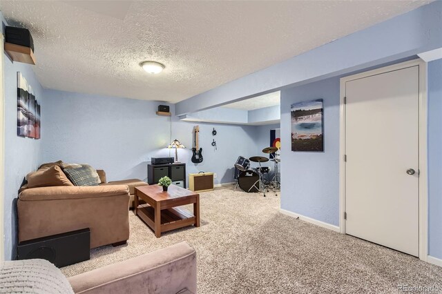 carpeted living room with a textured ceiling and baseboards
