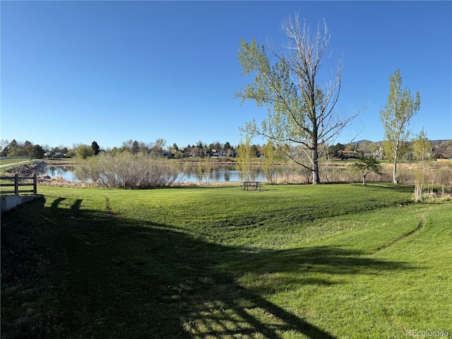 view of yard with a water view