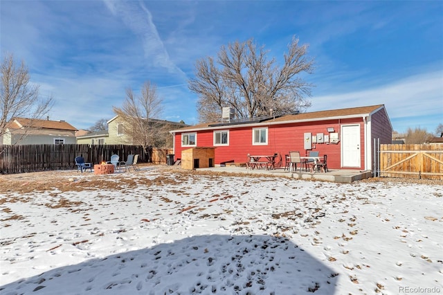 view of snow covered property