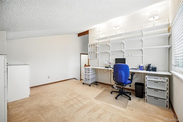 office with light carpet, a textured ceiling, and baseboards