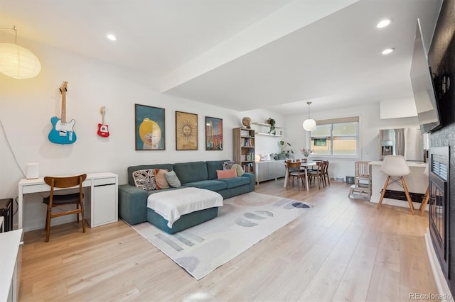 living room featuring recessed lighting and light wood finished floors