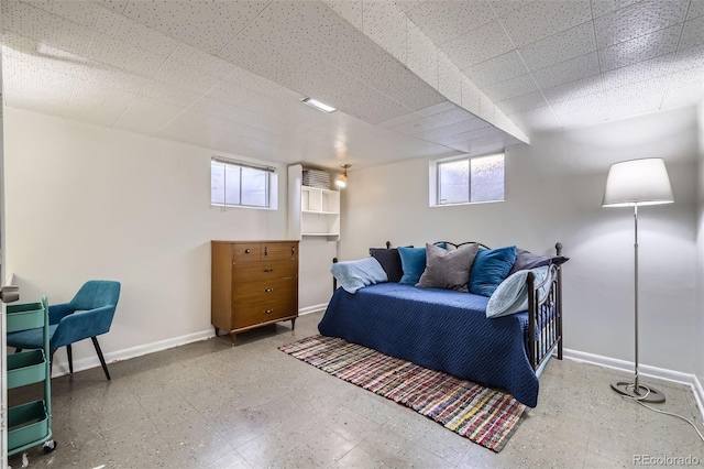 interior space featuring baseboards
