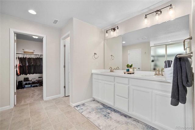 bathroom featuring vanity and tile patterned floors