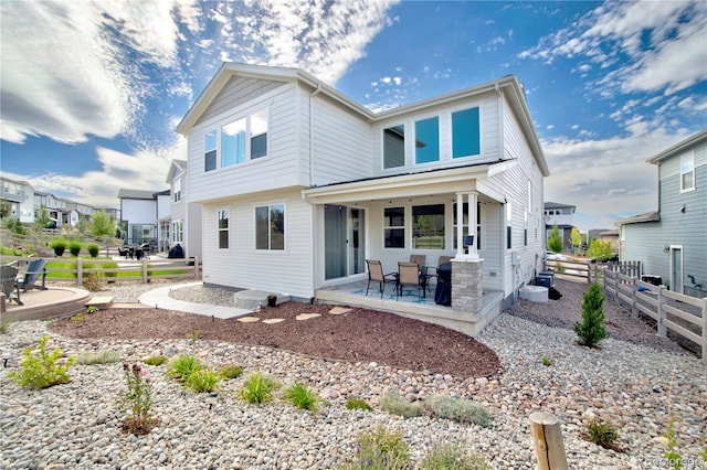 view of front of property featuring a patio area