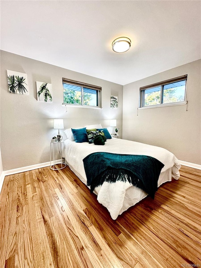 bedroom featuring hardwood / wood-style floors