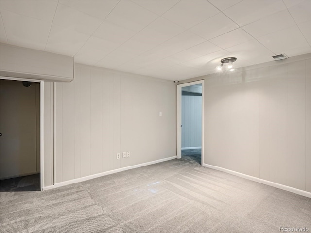 basement with carpet flooring