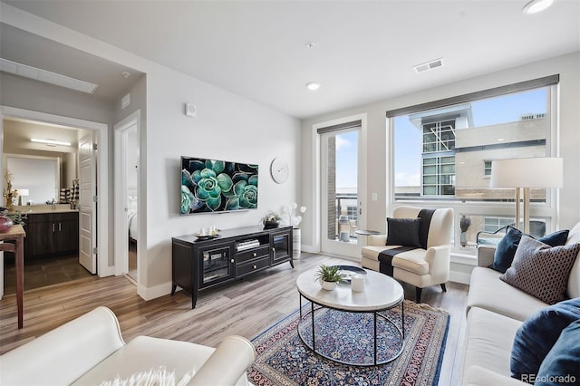 living room with hardwood / wood-style flooring