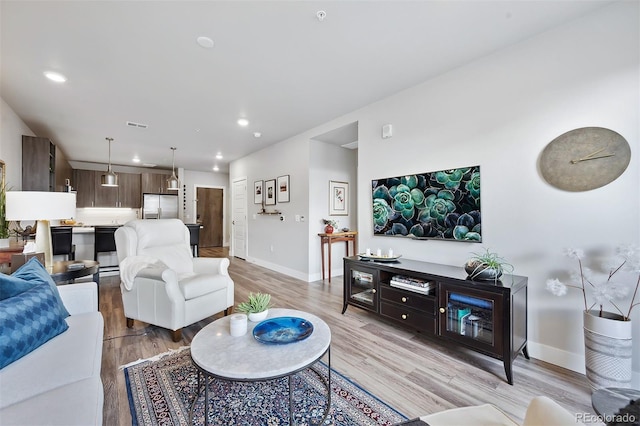 living room featuring light hardwood / wood-style flooring