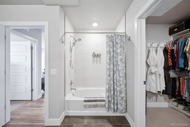 bathroom with shower / tub combo and tile patterned floors