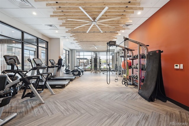 workout area with ceiling fan