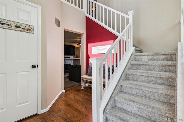 12559 W Crestline Dr, Littleton, CO 80127 - stairs featuring wood finished floors and baseboards