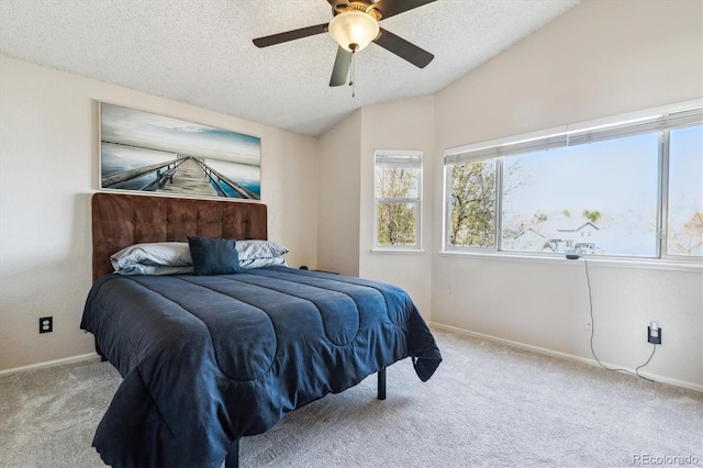 12559 W Crestline Dr, Littleton, CO 80127 - carpeted bedroom featuring a textured ceiling, baseboards, a ceiling fan, and vaulted ceiling