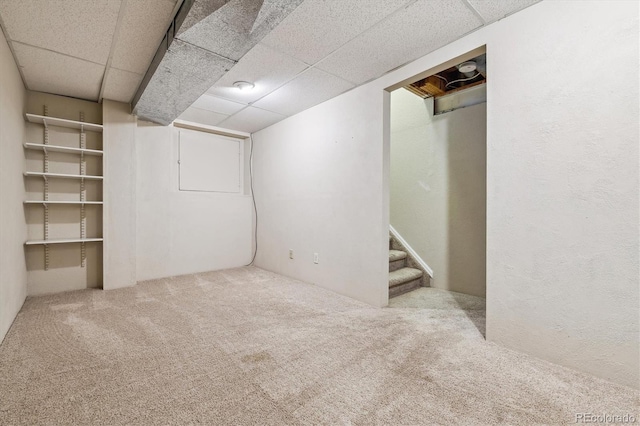 12559 W Crestline Dr, Littleton, CO 80127 - finished basement featuring stairs, carpet flooring, and a drop ceiling