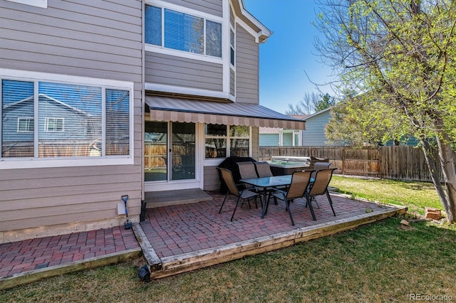 12559 W Crestline Dr, Littleton, CO 80127 - back of house featuring a patio, fence, and a lawn
