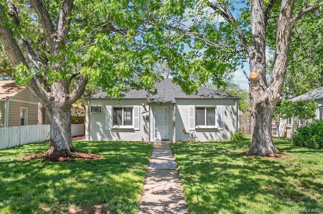 1177 Wabash St, Denver, CO 80220 - bungalow-style house featuring concrete block siding and a shingled roof