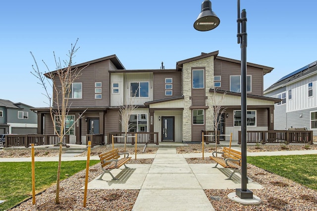 view of front of property featuring stone siding