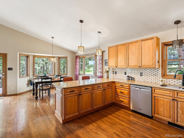 19795 Flint Ln, Morrison, CO 80465 - kitchen with stainless steel dishwasher, a chandelier, lofted ceiling, dark wood-style flooring, and light stone countertops