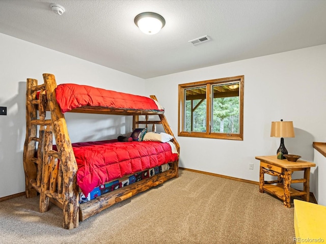 19795 Flint Ln, Morrison, CO 80465 - bedroom with carpet and a textured ceiling