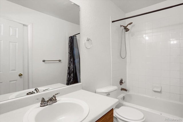 full bathroom featuring toilet, shower / tub combo with curtain, and vanity