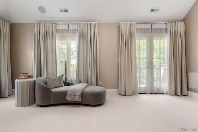 450 Steele St, Denver, CO 80206 - living area featuring carpet and baseboards