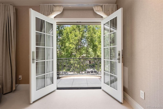 450 Steele St, Denver, CO 80206 - entryway featuring french doors and baseboards