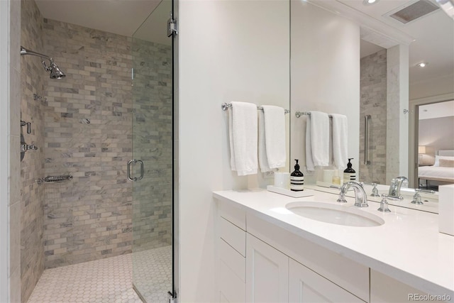 450 Steele St, Denver, CO 80206 - bathroom featuring a shower stall, vanity, connected bathroom, and recessed lighting