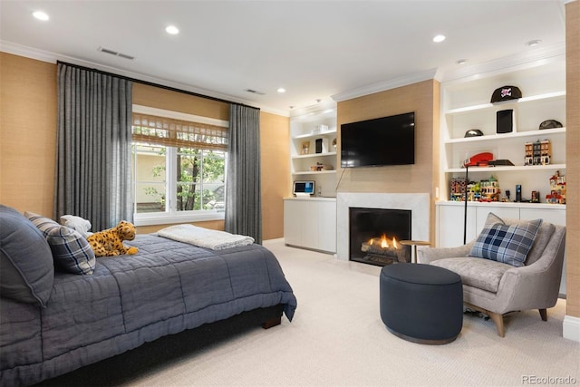 450 Steele St, Denver, CO 80206 - bedroom with ornamental molding, light carpet, a fireplace with flush hearth, and recessed lighting