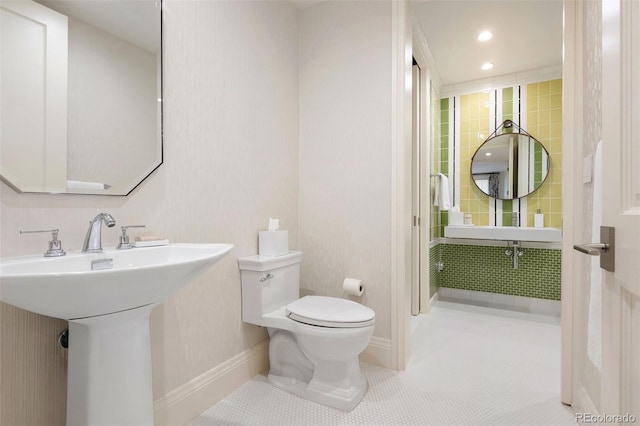 450 Steele St, Denver, CO 80206 - bathroom featuring tile patterned flooring and recessed lighting