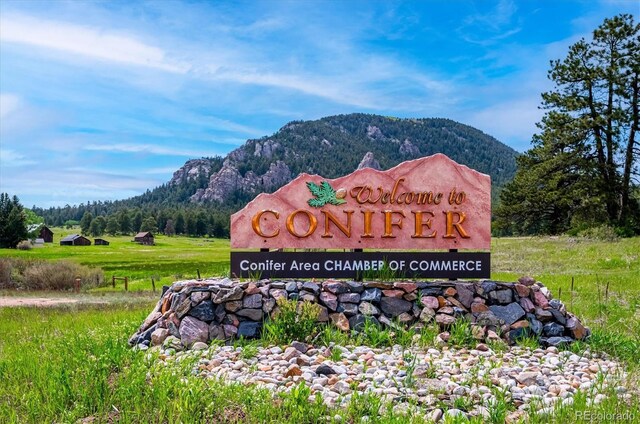 25357 Snyder Ave, Conifer, CO 80433 - community / neighborhood sign featuring a mountain view