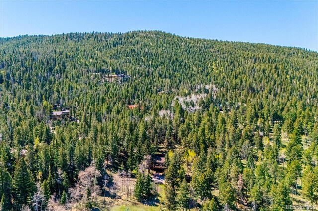 25357 Snyder Ave, Conifer, CO 80433 - aerial overview of property's location featuring a heavily wooded area