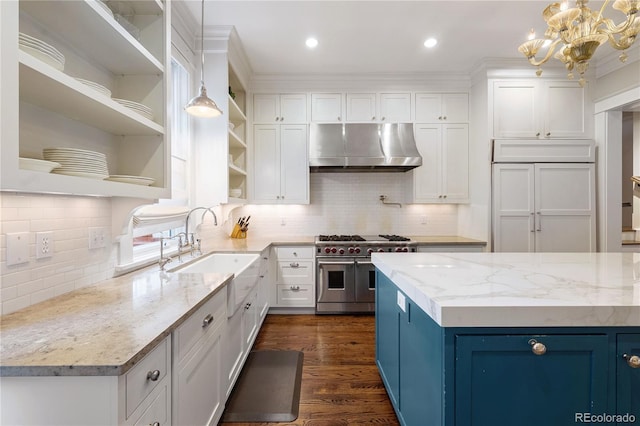 4535 E Montview Blvd, Denver, CO 80207 - kitchen featuring under cabinet range hood, range with two ovens, open shelves, a sink, and white cabinets