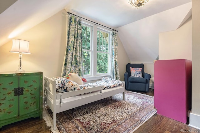 4535 E Montview Blvd, Denver, CO 80207 - bedroom featuring lofted ceiling and wood finished floors