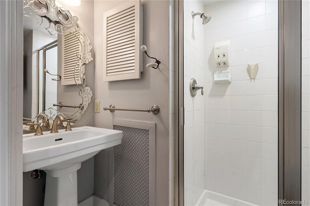 4535 E Montview Blvd, Denver, CO 80207 - bathroom featuring a shower stall, a sink, and radiator