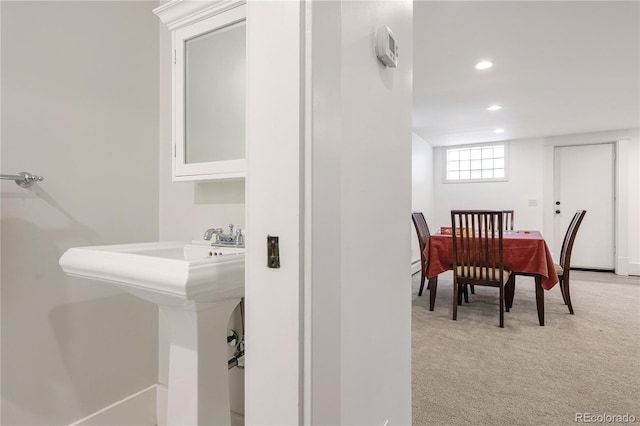 4535 E Montview Blvd, Denver, CO 80207 - dining area with light colored carpet, recessed lighting, and baseboards