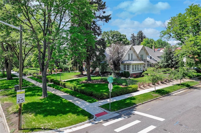 4535 E Montview Blvd, Denver, CO 80207 - view of front of house featuring a front lawn and view of scattered trees