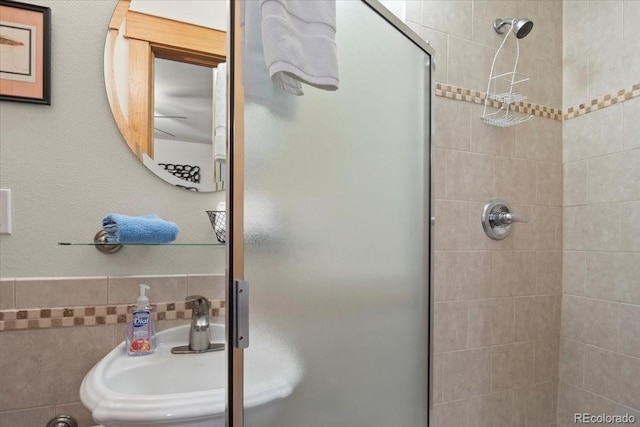 2625 Marys Lake Rd Unit 18C, Estes Park, CO 80517 - full bath featuring a stall shower and tile walls