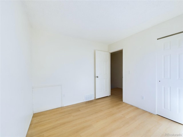 unfurnished bedroom with light hardwood / wood-style flooring