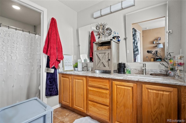 19707 E 59th Pl, Aurora, CO 80019 - bathroom with tile patterned flooring, a sink, double vanity, and a shower with curtain