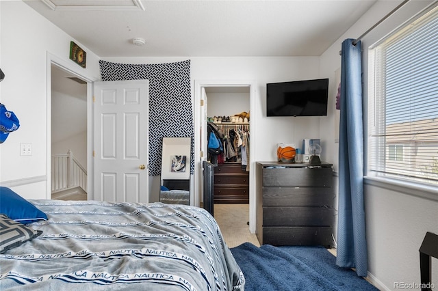 19707 E 59th Pl, Aurora, CO 80019 - carpeted bedroom featuring a closet and a spacious closet