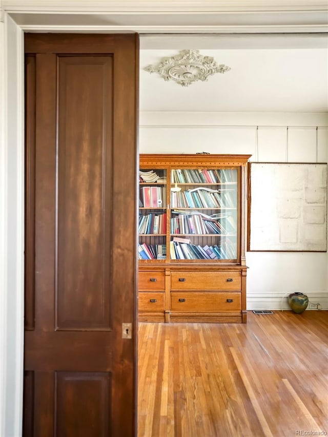 interior details featuring wood finished floors