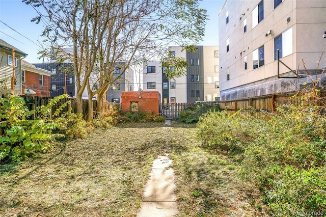 view of property's community featuring fence