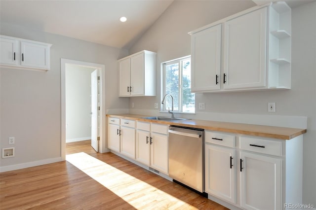27627 E Broadview Dr, Kiowa, CO 80117 - kitchen with dishwasher, a sink, open shelves, lofted ceiling, and white cabinetry