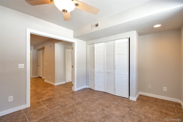 27627 E Broadview Dr, Kiowa, CO 80117 - unfurnished bedroom with a closet, tile patterned flooring, baseboards, and ceiling fan