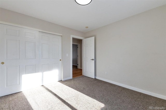 27627 E Broadview Dr, Kiowa, CO 80117 - unfurnished bedroom with carpet, baseboards, and a closet
