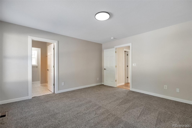 27627 E Broadview Dr, Kiowa, CO 80117 - unfurnished bedroom with carpet flooring, baseboards, and ensuite bath
