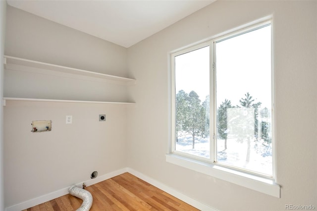27627 E Broadview Dr, Kiowa, CO 80117 - laundry room featuring electric dryer hookup, light wood-type flooring, baseboards, and washer hookup