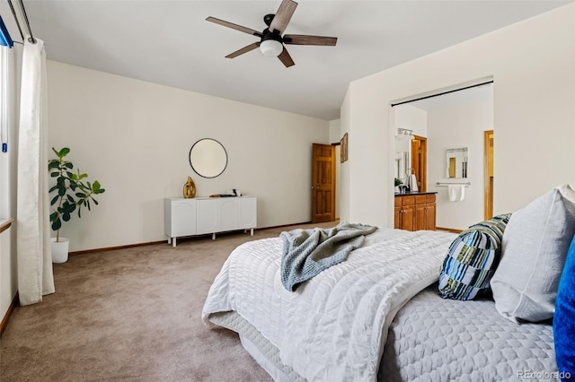 bedroom featuring ceiling fan, carpet, and baseboards